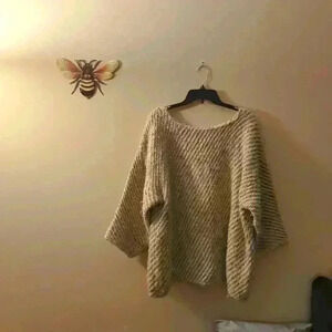 White and brown, knitted sweater.